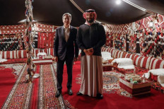 Tent meeting: United States Secretary of State Antony Blinken (left) and Saudi Crown Prince Mohammed bin Salman pose for journalists on Jan. 8, 2024 during their meeting in Al-Ula, northwestern Saudi Arabia. Blinken is on a weeklong trip aimed at calming tensions across the Middle East.