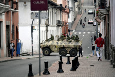Ecuadorean security forces patrol the area around the main square and presidential palace after Ecuadorean President Daniel Noboa declared the country in a state of “internal armed conflict“ and ordered the army to carry out military operations against the country's powerful drug gangs, in downtown Quito on January 9, 2024. Ecuador's new president, 36-year-old Daniel Noboa, is grappling with a security nightmare after the escape from prison of one of the country's most high profile gangsters, Jose Adolfo Macias, known as “Fito.“