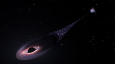 In this illustration released by NASA on April 7, 2023, an artist's impression depicts a runaway supermassive black hole that was ejected from its host galaxy as a result of a tussle between it and two other black holes. 