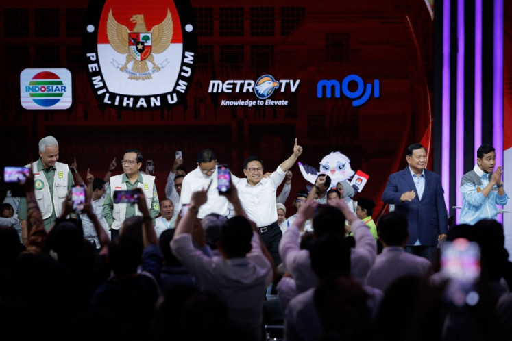 Presidential candidate Anies Baswedan (third left), vice presidential candidate Muhaimin Iskandar (third right), presidential candidate and Indonesias Defence Minister Prabowo Subianto (second right), vice presidential candidate Gibran Rakabuming Raka (right), presidential candidate and former Central Java governor Ganjar Pranowo (left) and vice presidential candidate Mahfud MD react after the last vice presidential election debate at the Jakarta Convention Center (JCC) on Jan. 21, 2024.