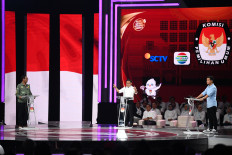 Vice presidential candidate Muhaimin Iskandar (center) faces off with rivals Mahfud MD (left) and Gibran Rakabuming Raka on Jan. 21, 2024, at the fourth televised presidential election debate held at the Jakarta Convention Center in Jakarta.