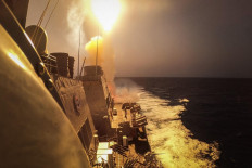 The United States Arleigh Burke-class guided-missile destroyer USS Carney (DDG 64) defeats a combination of Houthi missiles and unmanned aerial vehicles in the Red Sea on Oct. 19, 2023.