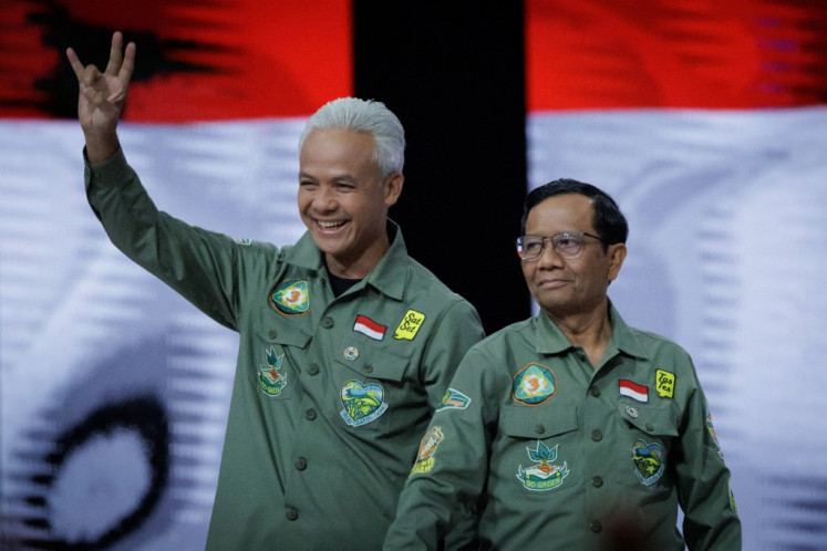 Presidential candidate and former Central Java governor Ganjar Pranowo (left) and vice presidential candidate Mahfud MD attend the last vice presidential election debate on Jan. 21, 2024, at the Jakarta Convention Center (JCC) in Jakarta.