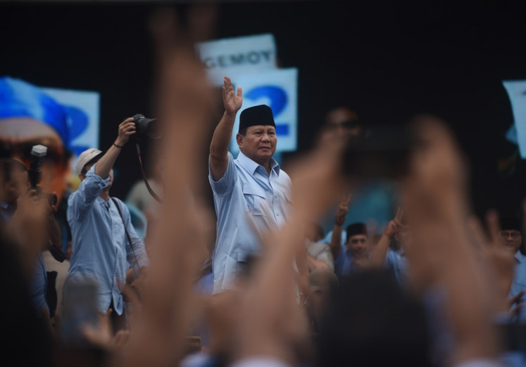 Presidential candidate Prabowo Subianto greets his supporters during a campaign event in Serang, Banten on Jan. 27, 2024.