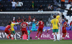 Australian defender Harry Souttar scores the team's fourth goal during a round of 16 match against Indonesia at Jassim bin Hamad Stadium in Al Rayyan, Qatar on Jan. 28, 2024.