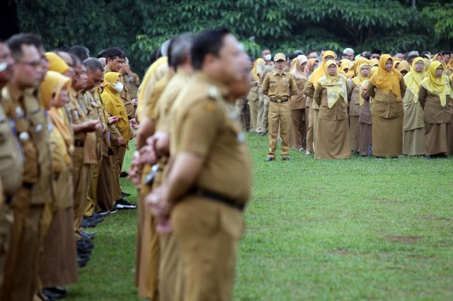 Government employees take part in a ceremony to mark the start of the work year on Jan. 2, 2024, at Tegar Beriman Square in Cibinong, Bogor regency, West Java.