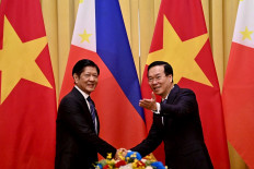 Vietnam, Philippines seal deals on South China Sea security