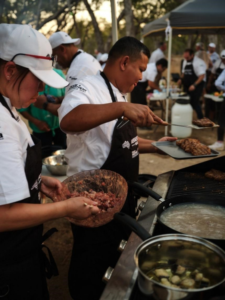 Chef Edi cooks in a competition in Queensland,