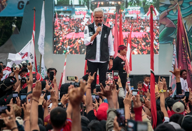 Presidential candidate and former Central Java governor Ganjar Pranowo addresses supporters during a campaign event of the Indonesian Democratic Party of Struggle (PDI-P) at the Wates Square Park in Yogyakarta on Jan. 28, 2024.