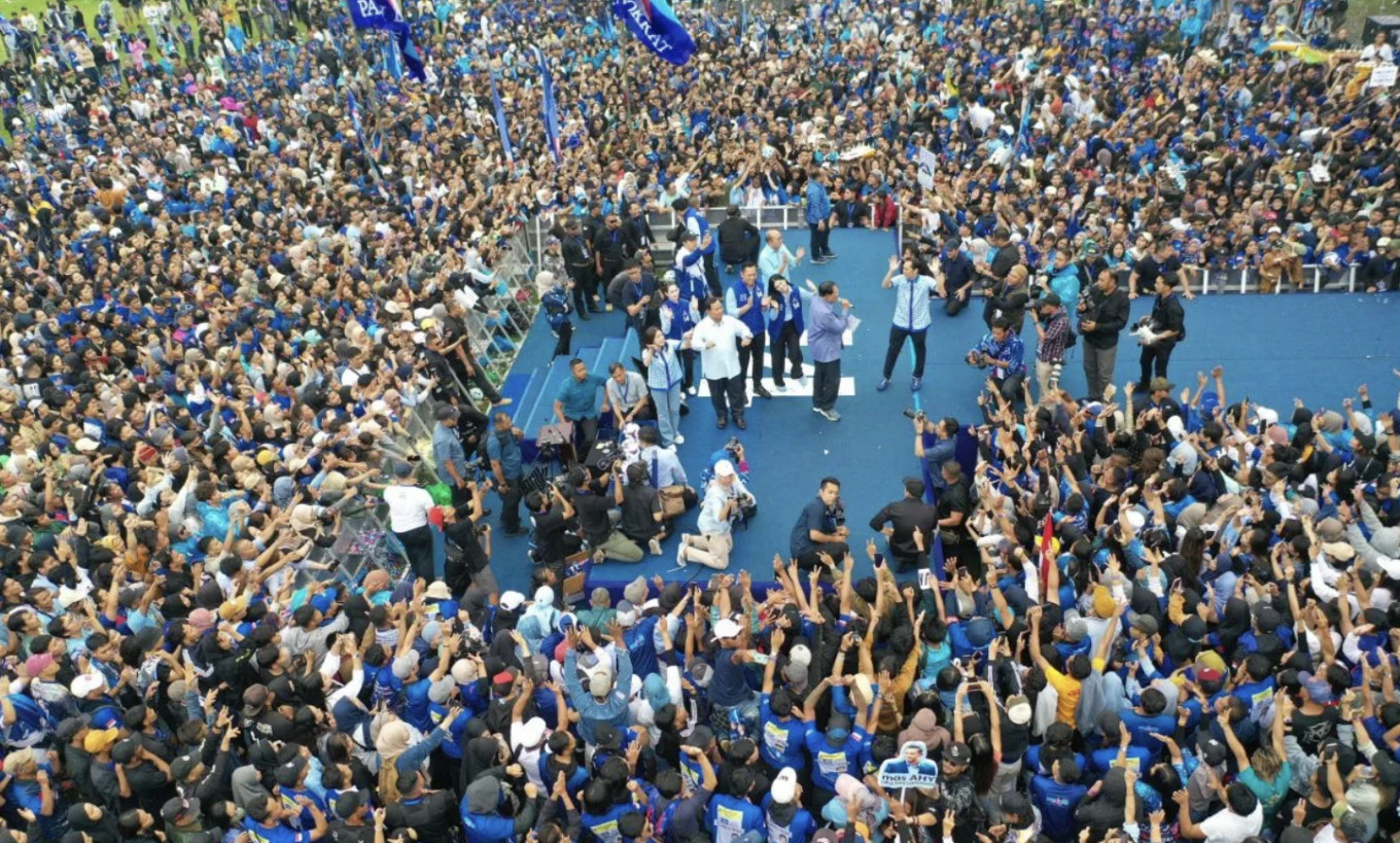 Gerindra Party presidential candidate Prabowo Subianto dances on stage during a campaign rally in East Java on Feb. 1, 2024.