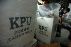 Workers pack ballot boxes for the 2024 general election on Jan. 31, 2024 at a logistics warehouse in Tegal regency, Central Java, for distribution to local polling stations one day before the polls on Feb. 14.