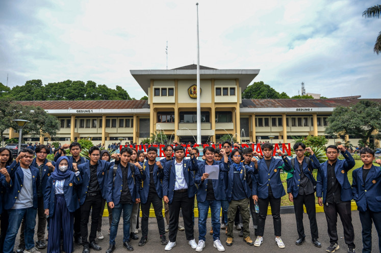 Members of Padjadjaran University's Student Executive Council (BEM) deliver a speech at the university's campus in Bandung, West Java on Feb. 3, 2024. The university's professors, students and alumni urged President Joko “Jokowi“ Widodo, state officials, presidential candidates and other members of the political elite to ensure a democratic and ethical 2024 election.