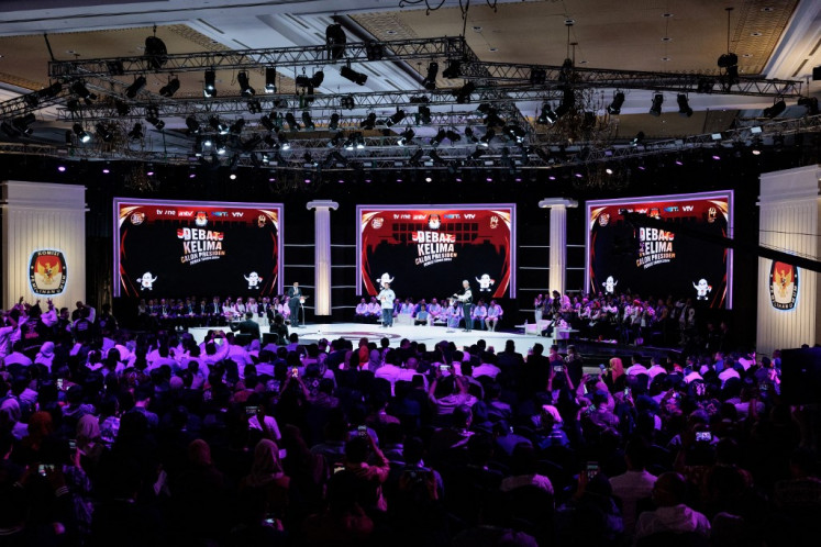 The three presidential candidates, Anies Baswedan (left), Prabowo Subianto (center) and Ganjar Pranowo, attend the last presidential election debate at the Jakarta Convention Center (JCC) in Jakarta on Feb. 4, 2024.