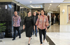 Speaker of the House of Representatives Puan Maharani (left) and Finance Minister Sri Mulyani Indrawati (right) share a light moment before their meeting on Jan. 25, 2024. 