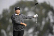 Kevin Yu of Chinese Tiapei follows his shot from the second tee on Jan. 25, 2024, during the Farmers Insurance Open at Torrey Pines South Course, in La Jolla, California, the United States.