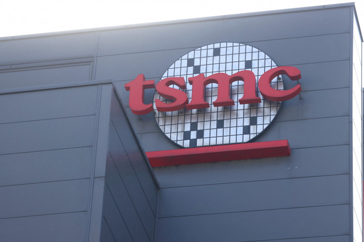 The logo of Taiwan Semiconductor Manufacturing Co (TSMC) is pictured at its headquarters, in Hsinchu, Taiwan, on Jan. 19, 2021.