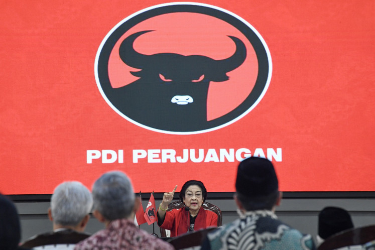 Indonesian Democratic Party of Struggle Chairwoman Megawati Soekarnoputri (center) delivers a speech during the party's 51st anniversary in Jakarta on Jan. 10, 2024.