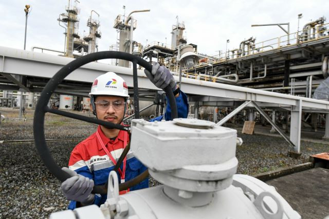 Technical check: A Pertamina EP Donggi Matindok field technician checks the Central Processing Plant (CPP) facilities at the Donggi gas field on Jan. 21, 2024, in Banggai, Central Sulawesi. State-owned oil and gas company Pertamina topped Fortune’s list of the 100 largest companies operating in the country last year. 