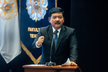 Then agrarian and spatial planning minister Hadi Tjahjanto delivers a speech during a Gadjah Mada University (UGM) School of Engineering academic senate meeting in Sleman, Yogyakarta, on Feb. 17, 2024.