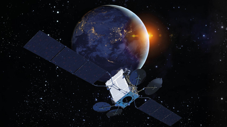The Merah Putih 2, a satellite made by French-Italian joint venture Thales Alenia Space on an order placed by state-owned telecommunication firm PT Telkom, is envisioned in this undated artist’s illustration. The Indonesian satellite was launched successfully into orbit on Feb. 21, 2024 aboard Falcon 9 of Elon Musk’s SpaceX.