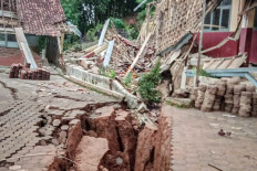 An elementary school, SDN I Babakan Talang, in Cibedug village, West Bandung, West Java, collapses on Feb. 29, 2024, after active land movement for more than a week in the area. 