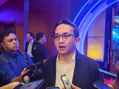 Septian Hario Seto, investment and mining undersecretary at the Office of the Coordinating Maritime Affairs and Investment Minister, speaks to reporters on Feb. 29, 2024 after a panel discussion at a CNBC Indonesia event in Jakarta.