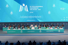 Delegates attend the 13th WTO ministerial conference in Abu Dhabi, United Arab Emirates, February 26, 2024. 