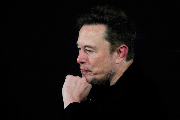 Tesla and SpaceX's CEO Elon Musk pauses during an in-conversation event with British Prime Minister Rishi Sunak in London on Nov. 2, 2023.