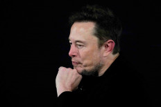 Tesla and SpaceX's CEO Elon Musk pauses during an in-conversation event with then British Prime Minister Rishi Sunak in London, Britain, Nov. 2, 2023. 
