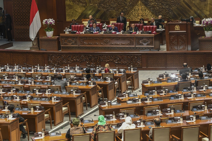 House of Representatives deputy speaker Sufmi Dasco Ahmad of the Gerindra Party (center) presides a plenary session at the Senayan legislative complex in Jakarta on March 5, 2024.