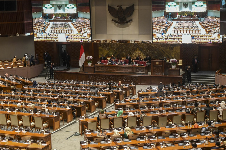 House of Representatives deputy speaker Sufmi Dasco Ahmad of Gerindra Party (center) presides a plenary session at the Senayan legislative complex in Jakarta on March 5, 2024.
