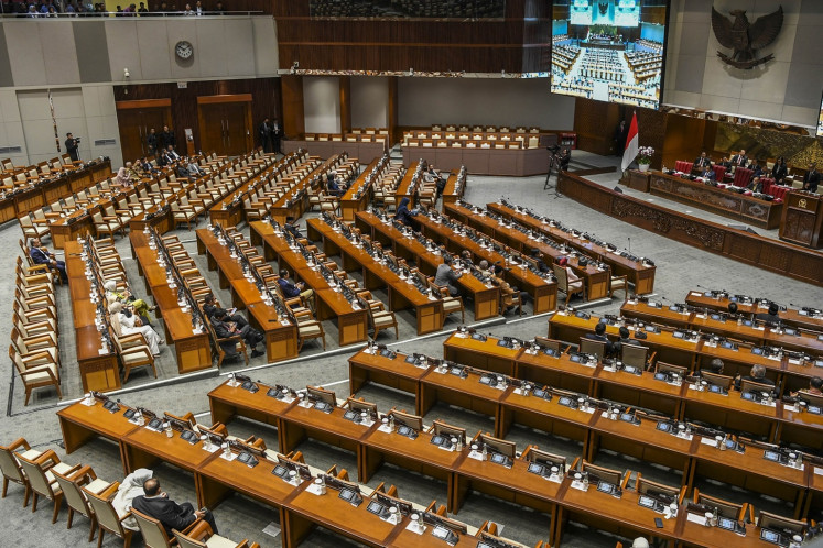 Lawmakers attend a House of Representatives plenary session on March 5, 2024, at the Senayan legislative complex in Jakarta.