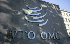 A logo is seen at the World Trade Organization (WTO) headquarters before a news conference in Geneva, Switzerland, on Oct. 5, 2022.