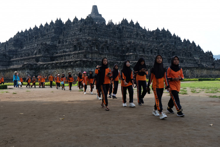 Encountering ancient history: Elementary school students take part in an educational tour on March 7, 2024, at Borobudur Temple in Magelang, Central Java. In addition to being a world-class tourist destination, Borobudur Temple is also an educational facility and research object for scientists and students.