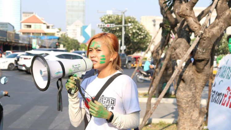 Phuon “Keo” Keoraksmey protests at an environmental rally in Phnom Penh, Cambodia, in an undated photo. 