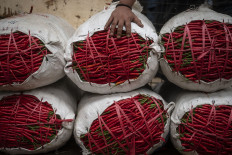 Inflation touches historic low in December