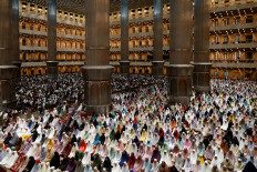 Muslims attend tarawih (evening prayers) on the first night of the holy fasting month of Ramadan on March 11, 2024. at Istiqlal Mosque in Central Jakarta.