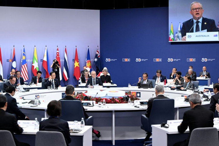 Australian Prime Minister Anthony Albanese (center, rear) is projected onto a giant screen on March 6, 2024, as he addresses a plenary meeting of the 2024 ASEAN-Australia Special Summit at the Melbourne Convention and Exhibition Centre in the capital city of Australia&rsquo;s southeastern Victoria state.