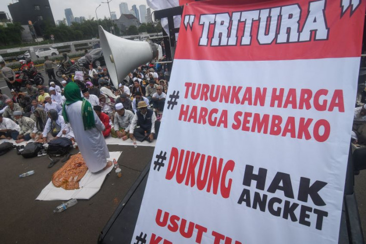 One spirit, one voice: Protestors perform Friday prayers on March 1, 2024 outside the House of Representatives in Jakarta. Afterward, they held a rally to voice their support for a House inquiry into alleged election fraud and to call on the government to lower staple food prices.
