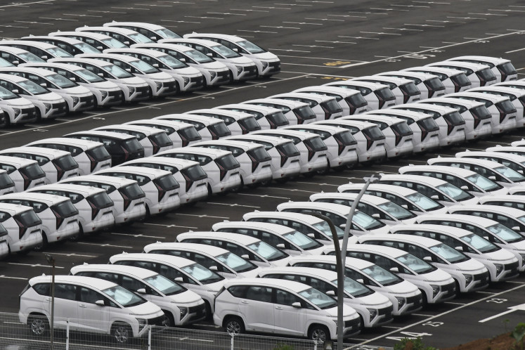 New cars are parked at a factory in Bojomangu, Bekasi, West Java, on March 13, 2024. According to data from the Association of Indonesia Automotive Industries (Gaikindo), wholesale car sales in February reached 70,656 units, up about 1.5 percent from January’s 69,617 units.