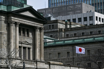 Asian stocks slide, yen wobbles ahead of BOJ verdict
