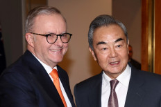 Australian Prime Minister Anthony Albanese (left) receives Chinese Foreign Minister Wang Yi for a meeting in Canberra on March 20, 2024. 