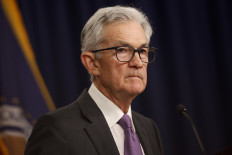 Federal Reserve Bank Chair Jerome Powell speaks during a news conference at the bank's William McChesney Martin building on March 20, 2024 in Washington, DC. Following a meeting of the Federal Open Markets Committee, Powell announced that the Fed left interest rates unchanged at about 5.3 percent, but suggested it may cut rates three times later this year as inflation eases.