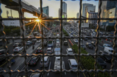Vehicles are stuck in traffic congestion on Jl. Gatot Subroto in Jakarta on March 19, 2024.