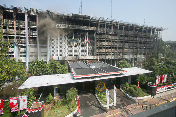 Ruins: The main building in the Attorney General’s Office compound smolders in South Jakarta on Sunday after it was gutted by fire on Saturday evening. Authorities are investigating the cause of the blaze.