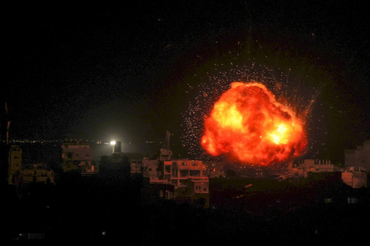 A fireball erupts during Israeli bombardment on Rafah, in the southern Gaza Strip, on March 26, 2024, amid ongoing battles between Israel and the Palestinian militant group Hamas. 