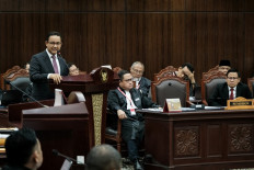 Indonesia's presidential election challenger Anies Baswedan (left) speaks  on March 27, 2024. during the first hearing of  their petition over the February 2024 elections, which was decisively won by Defense Minister Prabowo Subianto amid allegations of irregularities and fraud at the Constitutional Court in Jakarta.