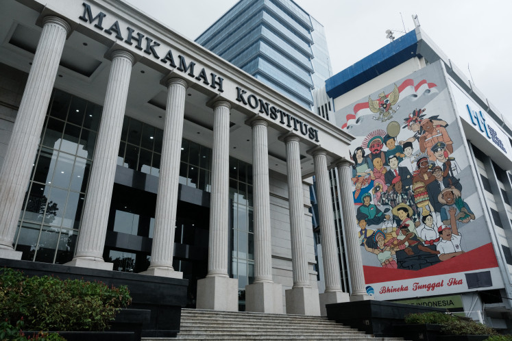 A banner bearing the national motto Bhinneka Tunggal Ika (Unity in Diversity) is displayed on March 27, 2024 next to the Constitutional Court in Gambir, Central Jakarta.