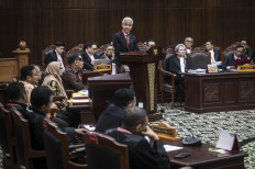 Indonesia's presidential election challenger Ganjar Pranowo  attend the first hearing of their petition over the February 2024 elections, which was decisively won by Defense Minister Prabowo Subianto amid allegations of irregularities and fraud, at the Constitutional Court in Jakarta on March 27, 2024.