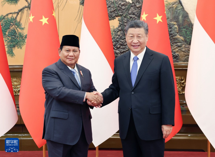 Defense Minister Prabowo Subianto (left) and Chinese President Xi Jinping attend a photo op on April 1, 2024 in Beijing, China. During his three-day visit to China on an invitation from Xi, the president-elect reiterated his commitment to maintain the close ties outgoing President Joko “Jokowi” Widodo had built between China and Indonesia.